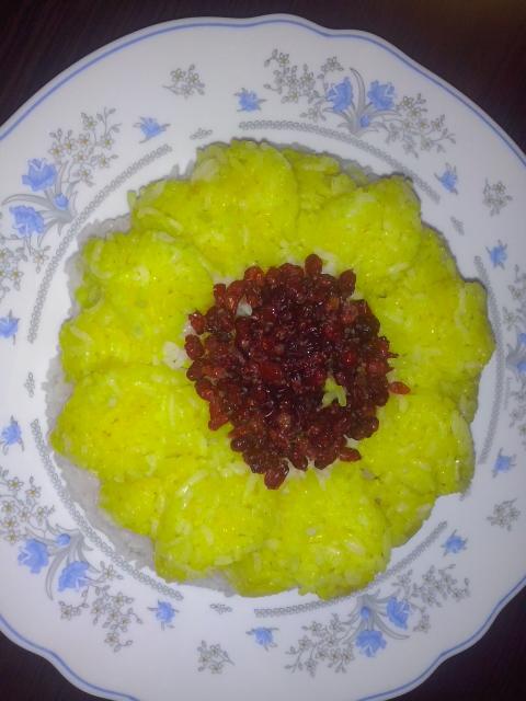 عکس تزيين برنج در قالب خيلي ناز شد به شکل گل آفتابگردان
