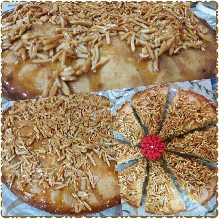 عکس کیک با رویه خلال بادام خیلی خوشمزه اس