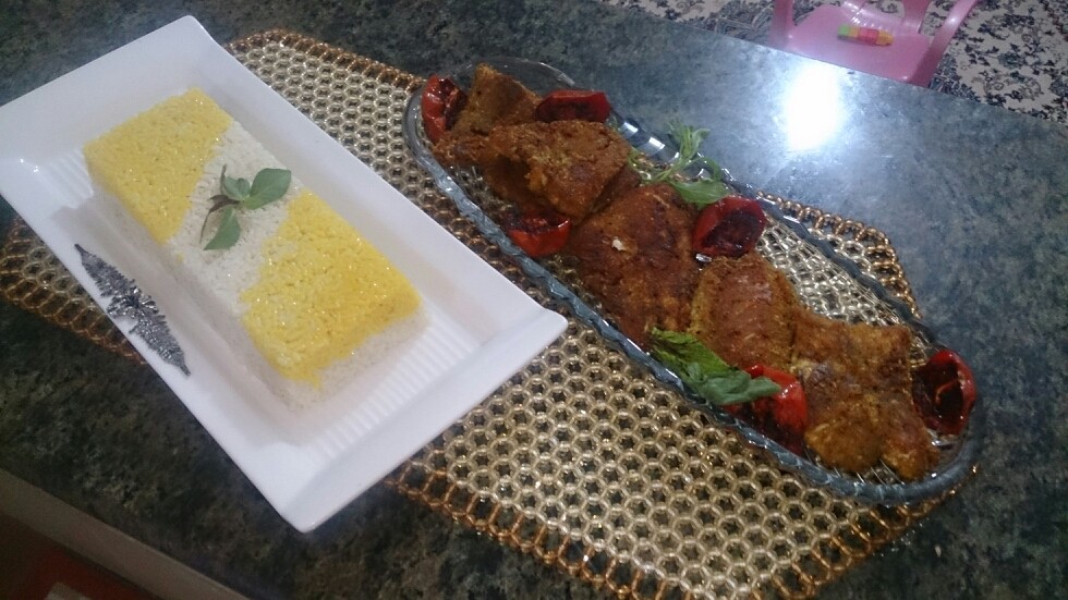 عکس خوراک ماهی با برنج  زعفرانی 