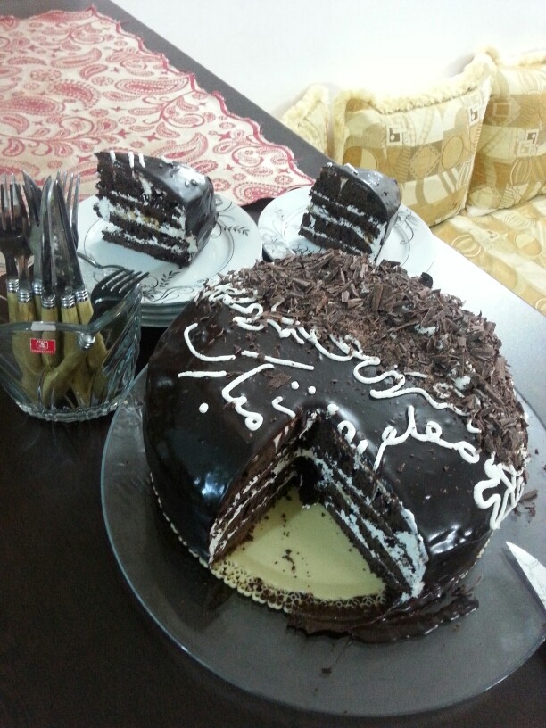 عکس کیک شکلاتی خامه ای.بمناسبت روز معلم برای همسرم