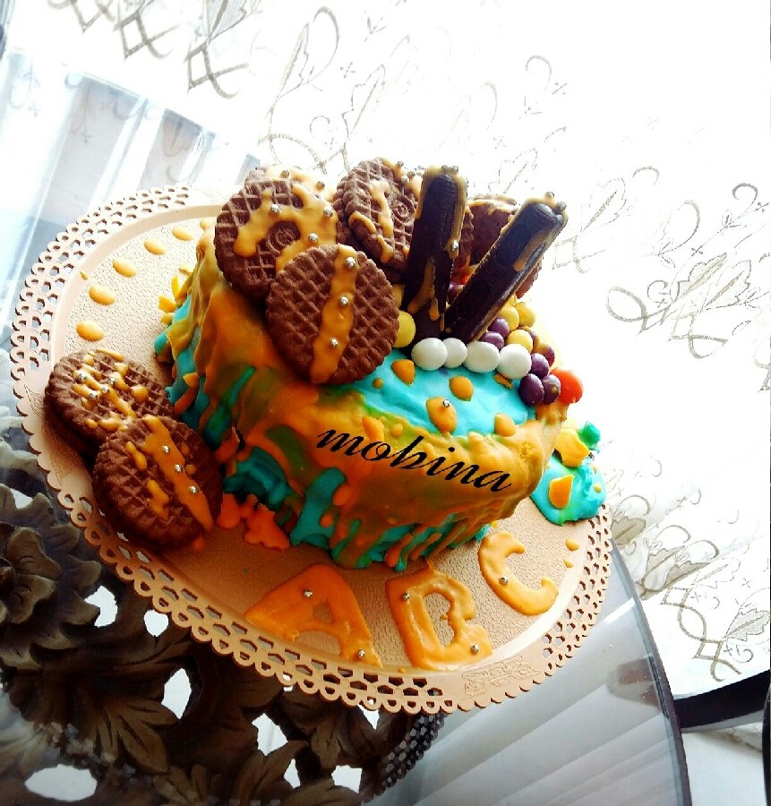 عکس کیک شیفون شکلاتی با روکش خامه پاستیلی