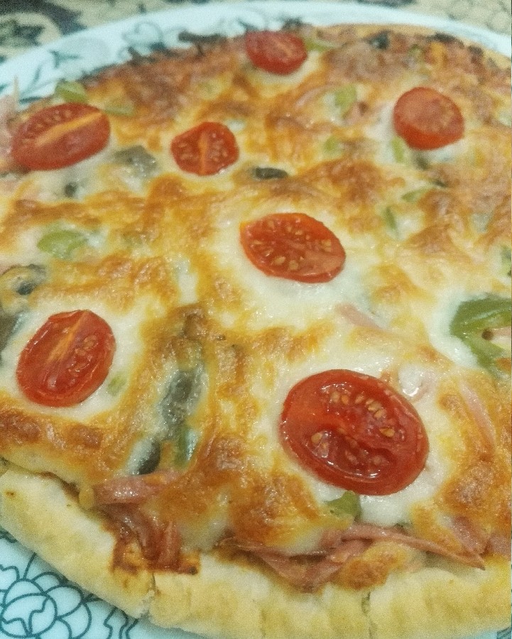 بفرمایییید.پیتزا خودم پز برای شوهرجانم