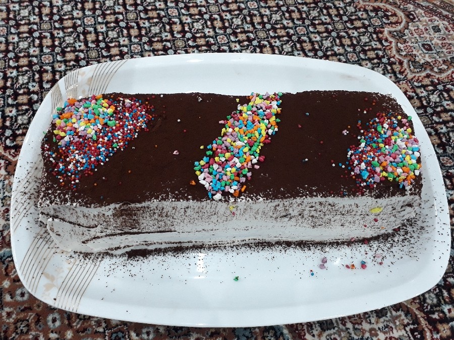 عکس کیک خیس شکلاتی با روکش خامه