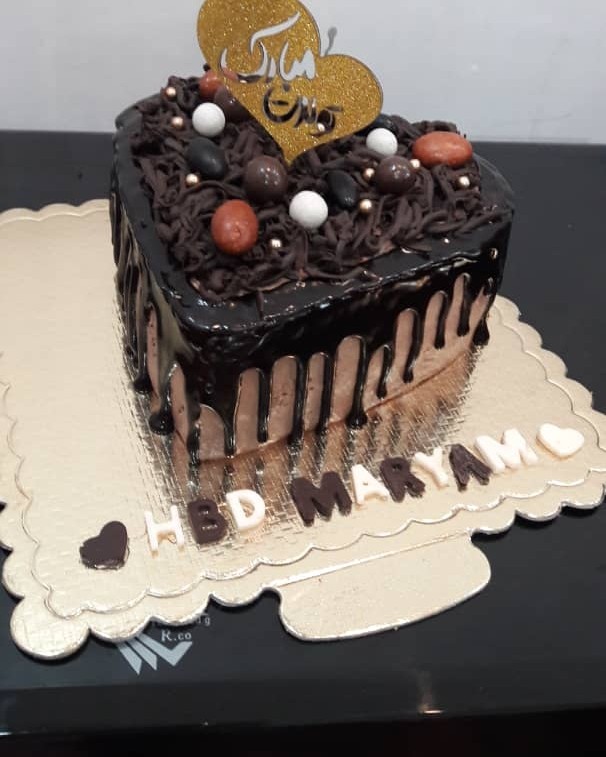 عکس کیک شکلاتی خامه ایی مغزدار