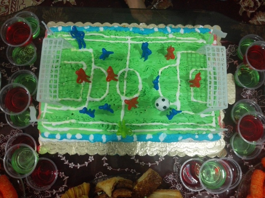 عکس کیک تولد با تم زمین فوتبال