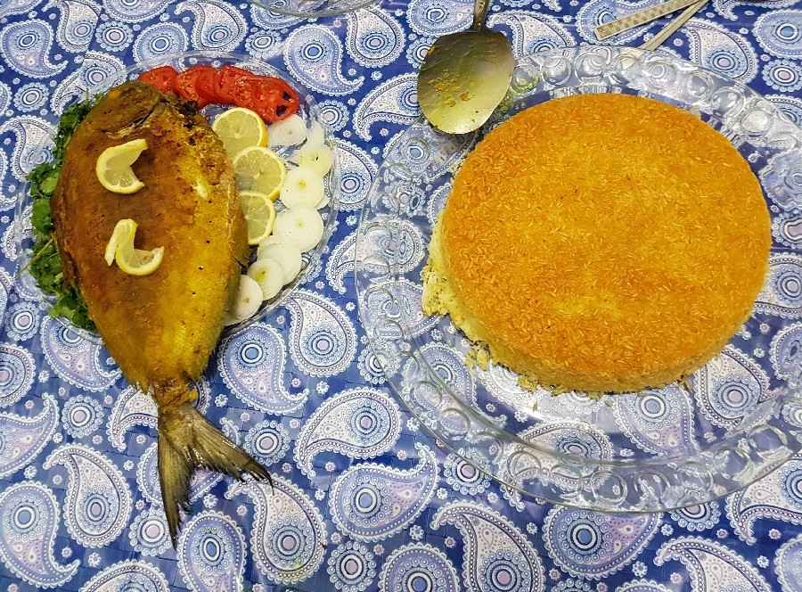 عکس ماهی شکم‌پر + پلو زعفرونی