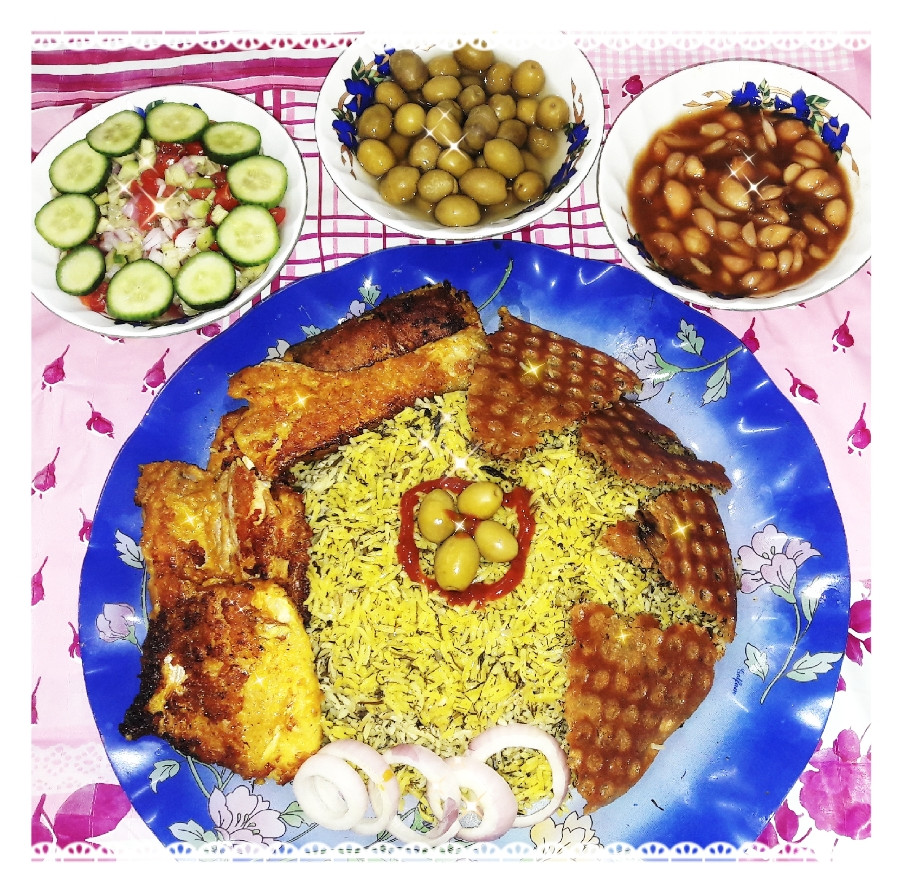 عکس سبزی پلو با ماهی با ته دیگ طلایی