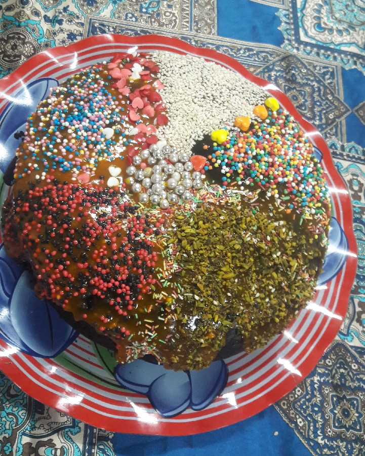 عکس کیک شکلات بی بی وبرش خورده کیک 