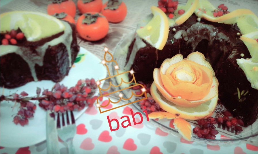 عکس کیک شکلاتی طلاپز باروکش گاناش و سس پرتقالی