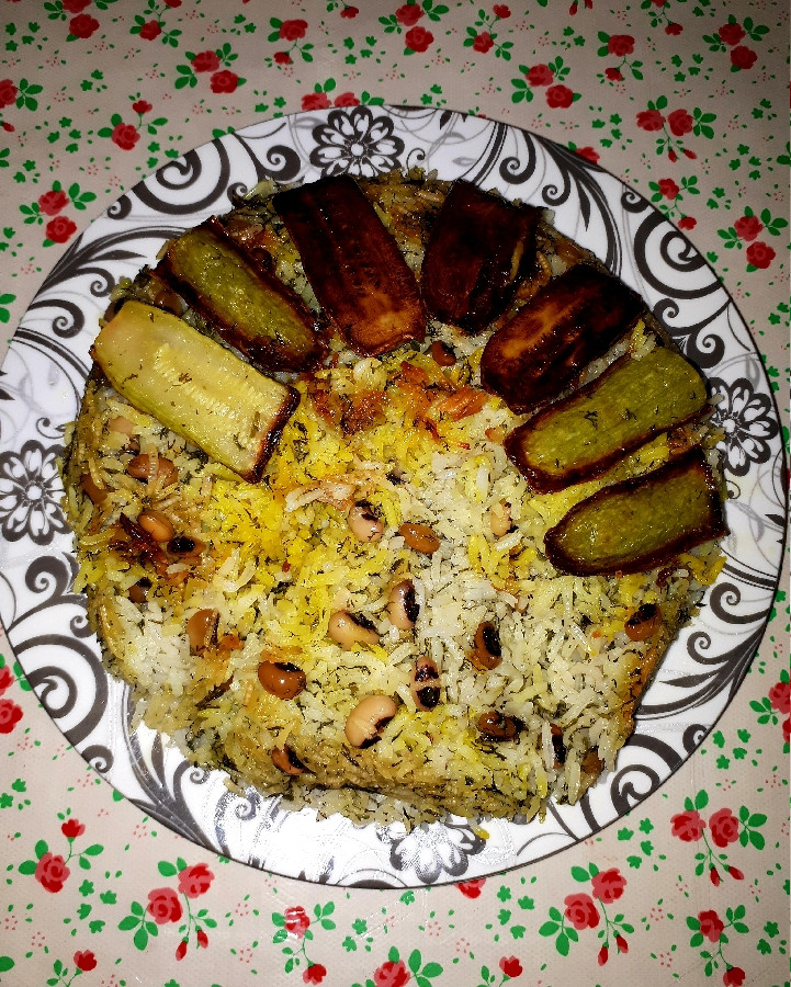 عکس پلوی لوبیا چشم بلبلی . با ته دیگ کدو سبز . جاتون خالی دوستان خوبم .