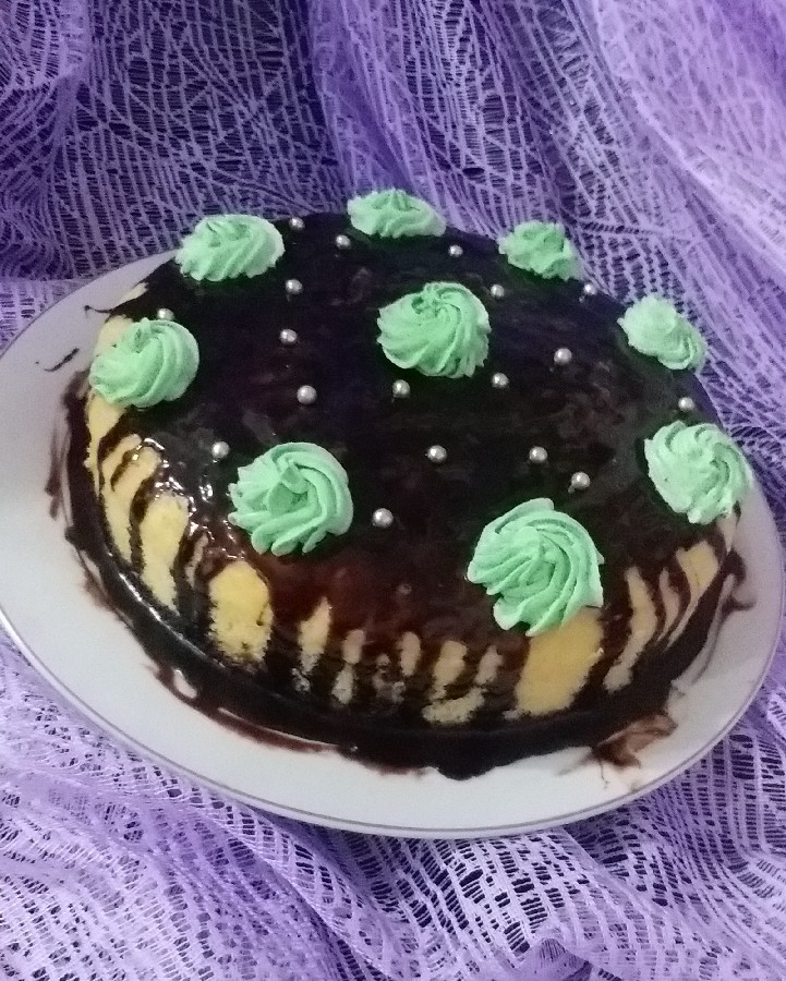 عکس کیک کاستر با روکش سس شکلاتی
