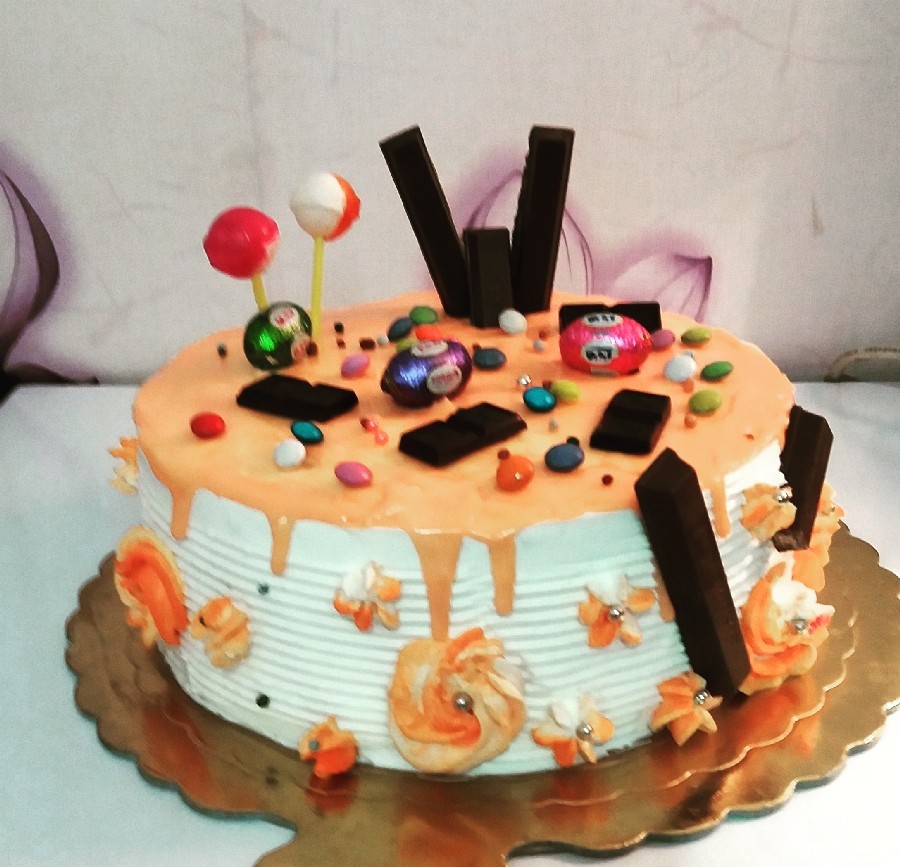 عکس #کیک خامه ای با روکش شکلات پرتقالی