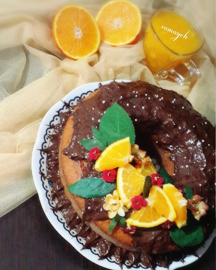 عکس کیک پرتقالی با کرمفیل شکلاتی