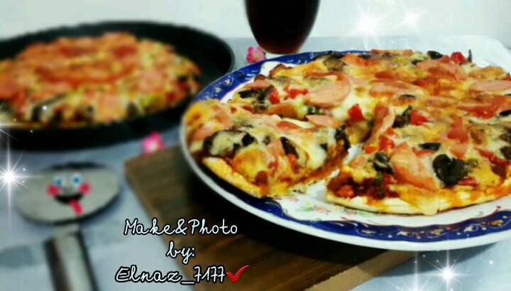 عکس پیتزا گوشت و قارچღ