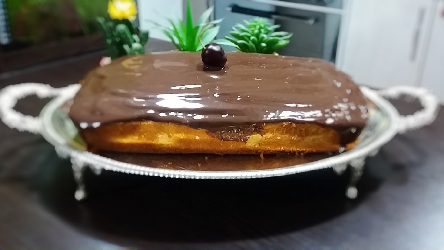 کیک وانیلی با روکش دنت کاکائویی