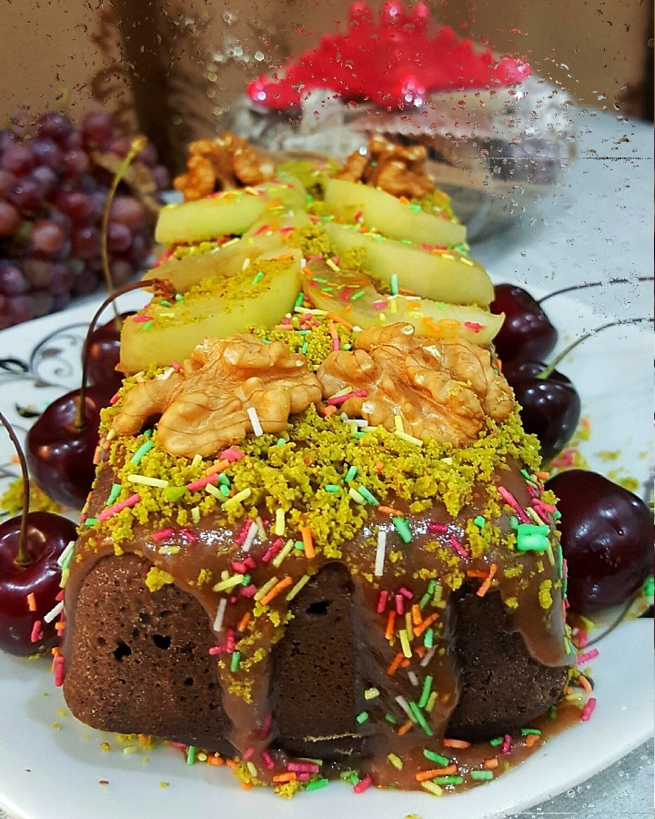 عکس کیک شکلاتی ساده با سس گاناش
ویژه ولادت امام رضا(ع)