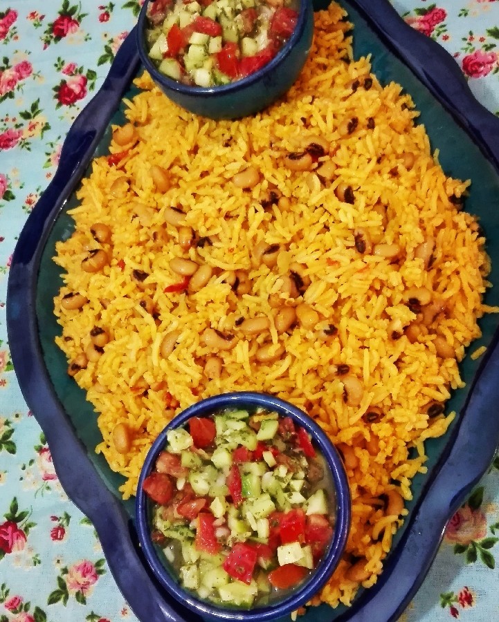 عکس کته گوجه با لوبیا چشم بلبلی وسالاد شیرازی