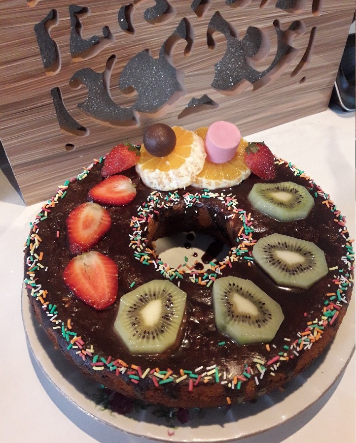 عکس کیک خامه ای با روکش شکلات