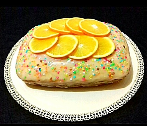 عکس کیک پرتقالی با رویه مخصوص وانیلی پرتقالی