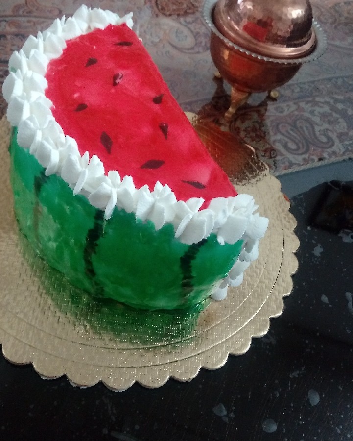 عکس کیک برش خورده هندوانه