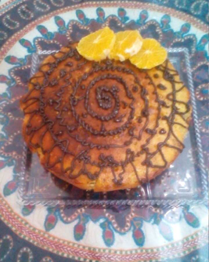 عکس کیک پرتقالی با شکلات چیپسی