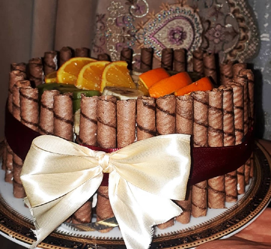 عکس کیک شکلاتی خوووووشمزه با قیلینگ موز و گردو