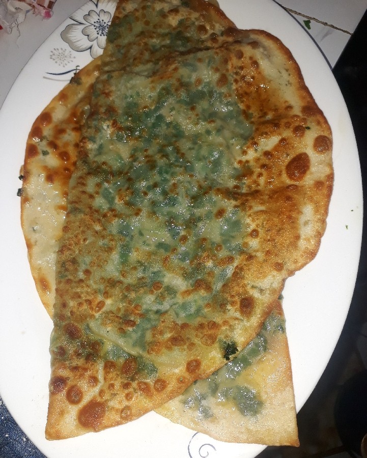 عکس بولانی یک نوع غذایی خوش مزه افغانی ?