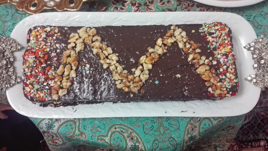 عکس کیک کاکائویی با روکش شکلاتی