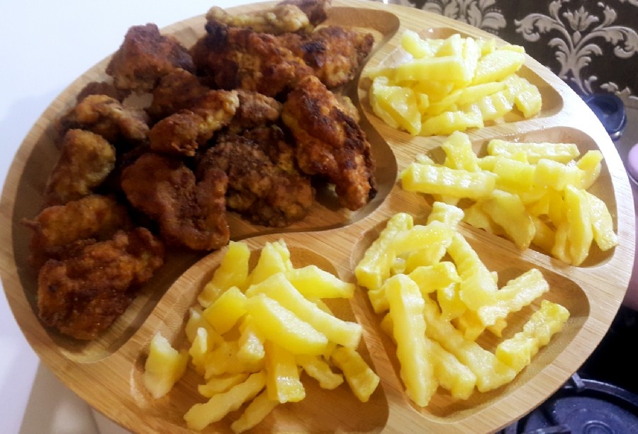 عکس مرغ سوخاری و سیب زمینی رستورانی