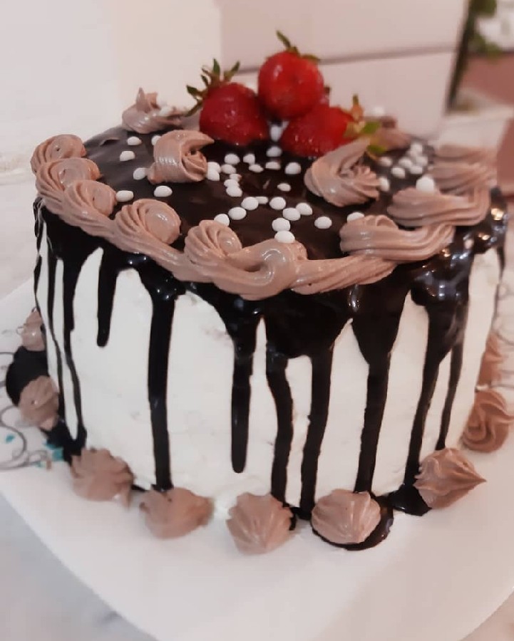 عکس کیک خامه ای شکلاتی