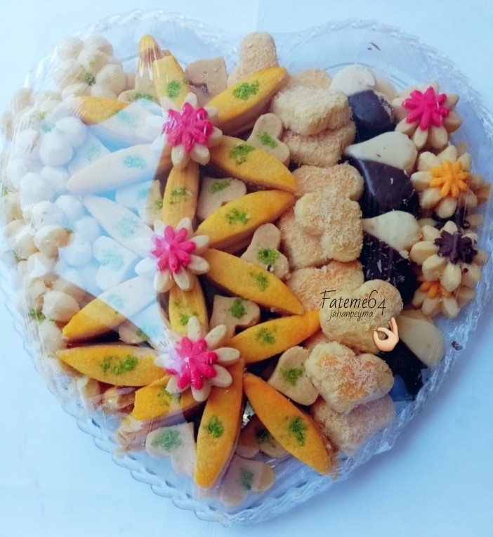 عکس شیرینی های خونگی نخودچی / گل مینا / زعفرانی/ کاکائویی 