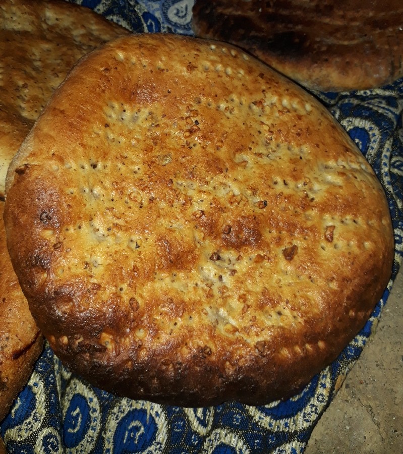 عکس پخت نان 
با تنور سنتی 