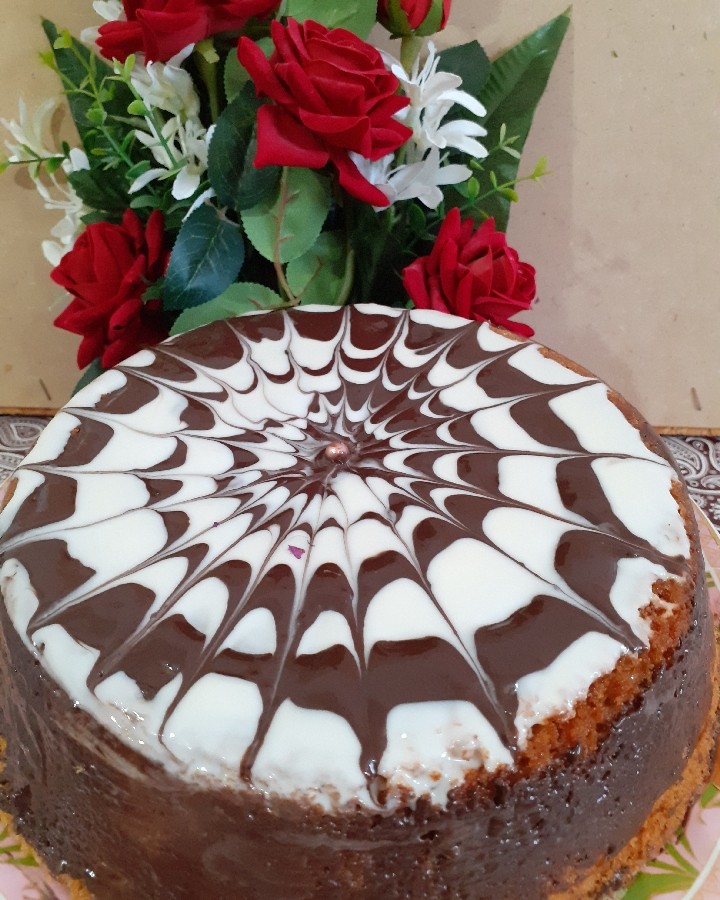 عکس کیک زبرا با شکلات تخته ای