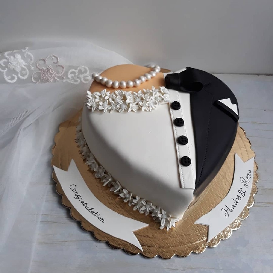 عکس کیک سفارشی برای عروس داماد با آرزوی خوشبختی