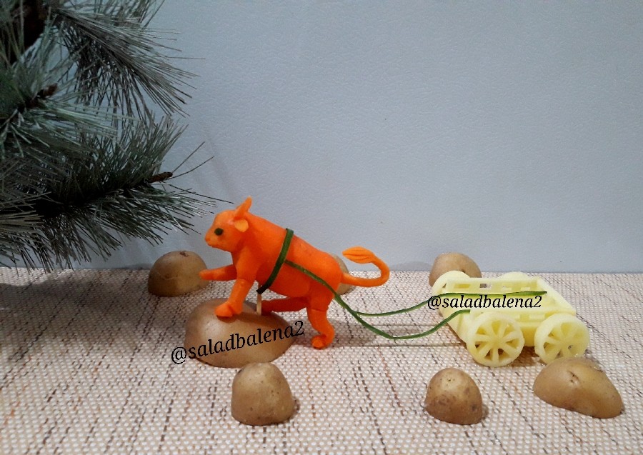 عکس گاوباهویج گاری با سیب زمینی