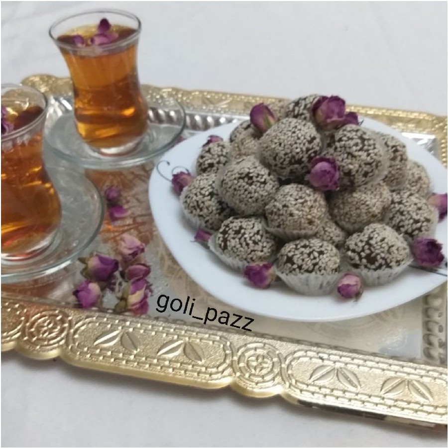 عکس توپک خرما و ارده کنجدی