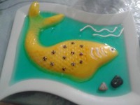 ﻛﺮﻡ ﺯﻋﻔﺮﻭﻧﻲ ﻫﻤﺮاﻩ ﺑﺎ ﮊﻟﻪ ﺁﻟﻮﻭﺭا