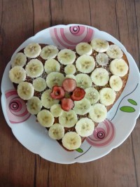 کیک موز با رویه کرم شیرین گردو نارگیل