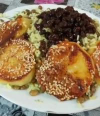 عدس پلو با ته دیگ کنجدی