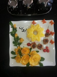 کباب دورنگ رولی با دورچین بشقاب