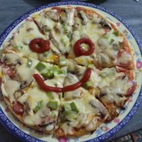 بفرمایید پیتزا دوستان گلم