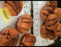 دونات (پیراشکی) توپی با رویه شیری