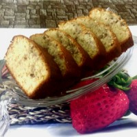 کیک موز با رویه کرم شیرین گردو نارگیل