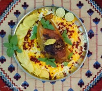 خروس شکم پر با پلو زعفرونی