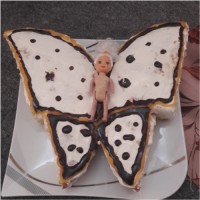 اینم کیک پرتقال با تزیین سس پرتقال وگاناش