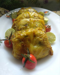 دلمه برگ کلم با رب انار و گوجه گیلاسی باغچه مامان