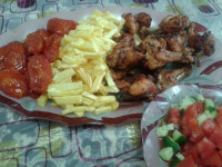 کتف سوخاری با طعم لیمویی همراه سیب زمینی و گوجه