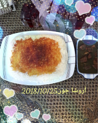 قرمه سبزی با ته دیگ سیب زمینی رنده