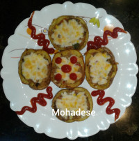 سیب زمینی تنوری شکم پر با سوسیس و پنیر