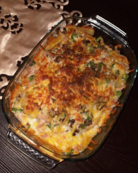 گراتن سیب زمینی با پنیر بسیار خوشمزه و لذیذ.